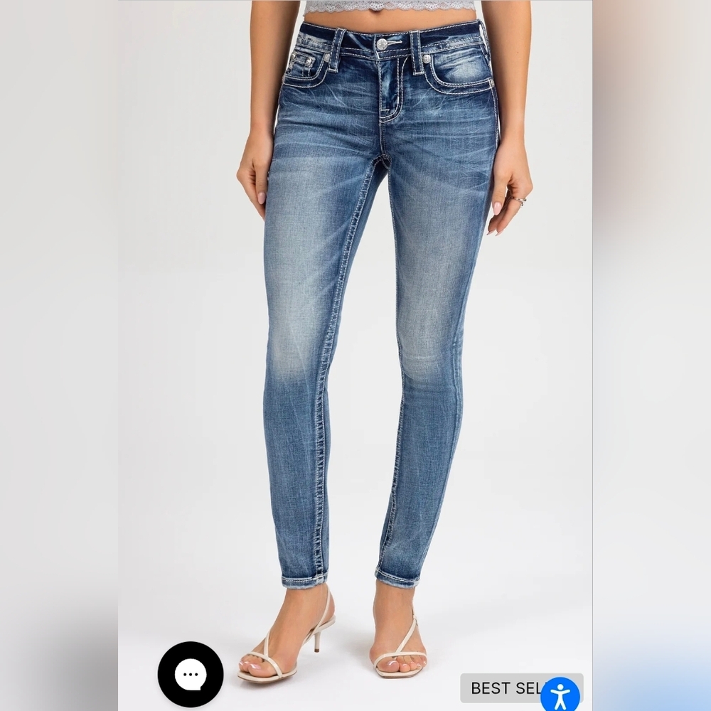 Torn Saddle Stitch Skinny Jeans